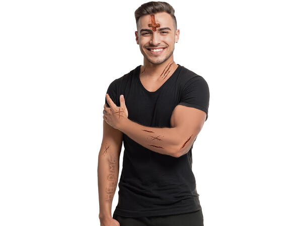 Tatoveringer - Besatte sår 1 Ark med tatoveringer - 30x14cm 